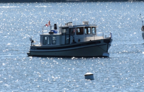 1999 Nordic Tug 32, At Ease on a Mooring