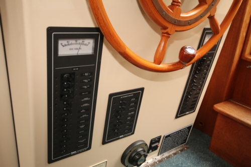 1999 Nordic Tug 32, Electrical Panels below Helm