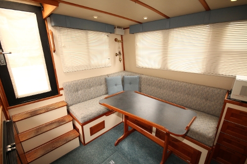 1999 Nordic Tug 32, Salon Settee and Dining Table