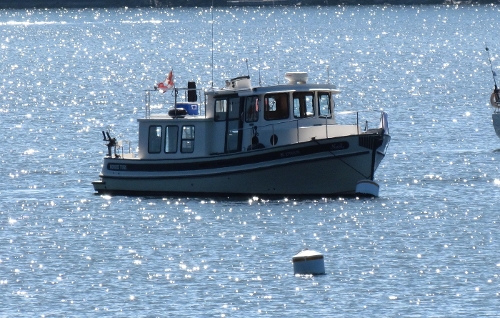 1999 Nordic Tug 32, At Ease on a Mooring