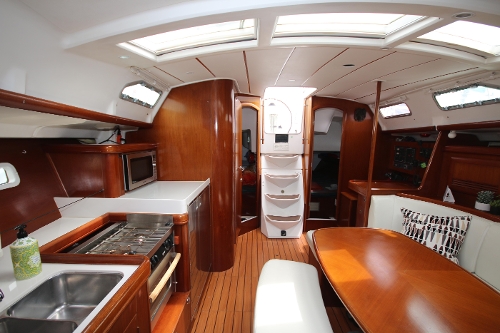 2005 Beneteau 393, Galley and Saloon looking aft